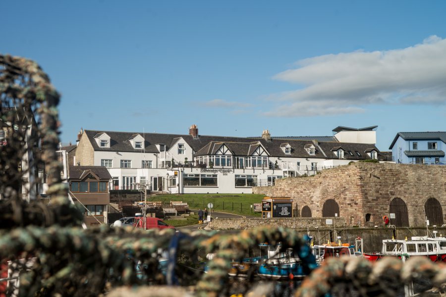 5-bamburgh-castle-view-overlooking-harbour-in-seahouses-1